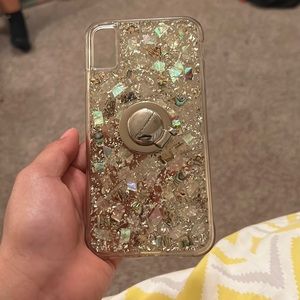 Shimmery crystallized phone case with ring hold.